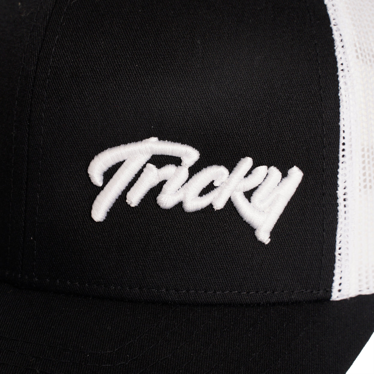 TRICKY SMALL LOGO 6 PANEL MESH TRUCKER CAP BLACK WHITE